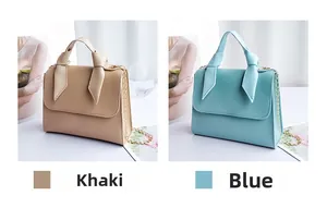 Detail of khaki and blue PU leather mini square bags with chain straps and knot handles