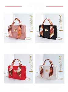 Quilted mini hand bags in four colors with floral silk scarves and gold chain straps