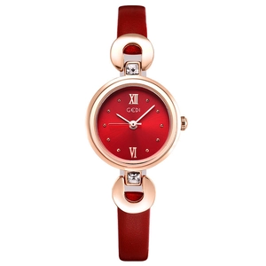 Montre quartz femme avec cadran rouge soleil, boîtier or rose et bracelet cuir