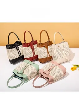 Six colors of woven bucket bags with drawstring closure and metal hardware rings