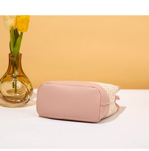 Detail shot of rectangular base in pink leather and beige woven straw texture