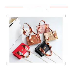 Quilted crossbody bags with silk scarf handles and chain straps in multiple colors