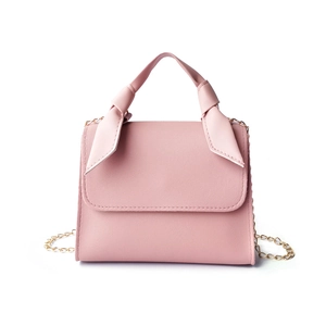 Minimalist pink mini handbag for women with knotted top handle and gold chain strap