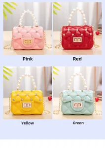 Mini jelly bags in pink red yellow green with diamond pattern and pearl handle