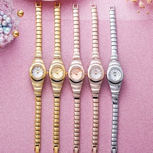 Elegant women's quartz watch collection with diamond-encrusted bezel and metallic link strap