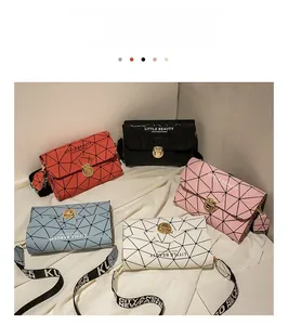 Detail of geometric pattern shoulder bags with metal locks and wide letter straps in 5 colors