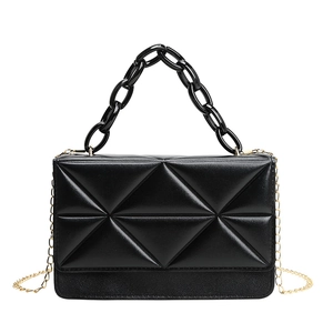 Women's black geometric quilted flap bag with stylish dual-chain handles on white background