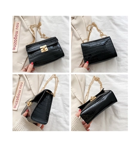 Multi-angle views of black crocodile pattern crossbody bag with gold chain and metal lock