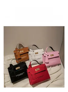 Detailed collection of shiny patent leather mini bags with gold twist locks in five colors