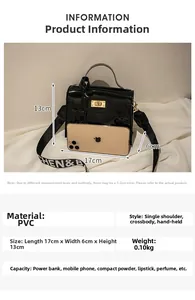 Detailed interior view of a black patent PVC crossbody bag showing phone storage capacity