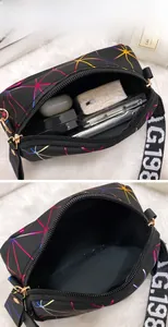 Macro view of compact crossbody bag showing spacious interior for makeup and gadgets