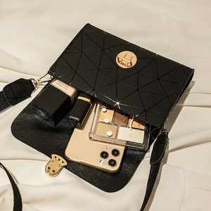 Classic geometric flap crossbody bag for women showing interior storage and phone