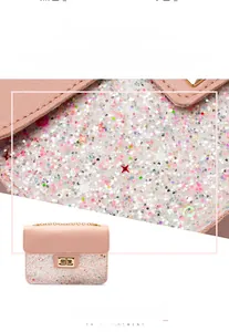 Detail of pink sequin shoulder bag showing PU leather texture and golden chain strap