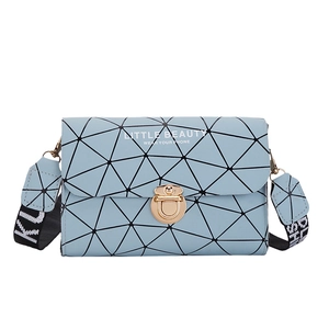 Light blue geometric square crossbody bag with 3D triangle pattern and wide strap