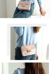 Detail of light pink sequin crossbody bag with gold metal twist lock and chain strap