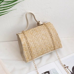 Minimalist straw woven crossbody bag with chain strap and V-shaped texture on white surface