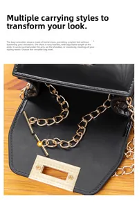 Detail of black glossy jelly bag with golden chain strap and adjustable T-bar buckle