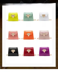 Collection of jelly handbags in nine vibrant colors with gold studs and chain straps
