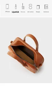 Détail de l'intérieur du sac à main en cuir matelassé marron montrant l'espace de rangement
