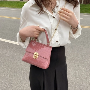 Pink croc-embossed mini handbag with gold chain strap and metallic twist lock for women