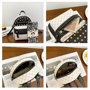 Mini fashion backpack showing interior capacity with studs and color block detail