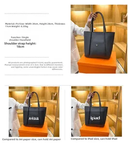 Detail view of large capacity black PU tote bag showing dimensions 34x28x11cm