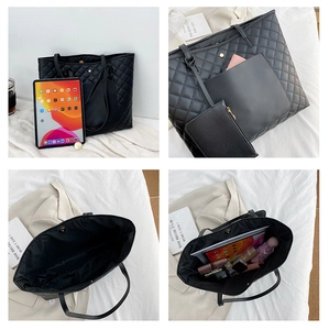 Detail view of large quilted tote bag showing interior capacity and matching coin purse