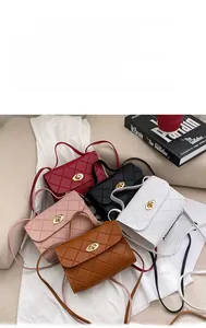 Selection of quilted mini crossbody bags in red, black, white, pink and brown leather