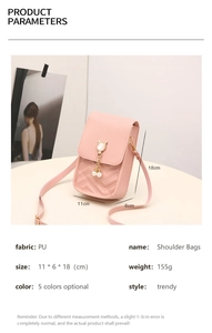 Detailed view of pink quilted PU leather phone bag with cat ear clasp and pearl tassel