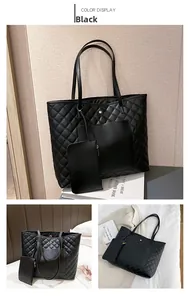 Detail view of black quilted tote bag texture and matching hanging coin purse