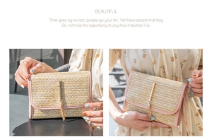 Detail of straw envelope bag with pink leather trim, gold T-bar buckle and fringe tassel