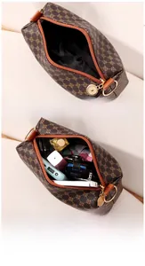 Detail of brown clover print PU leather makeup bag showing spacious storage capacity
