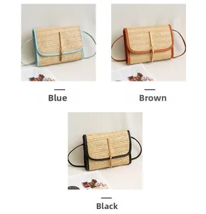 Straw shoulder bags with fringe trim in blue, brown and black colors for summer