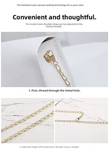 Detail of adjustable gold-plated chain strap on white quilted crossbody bag