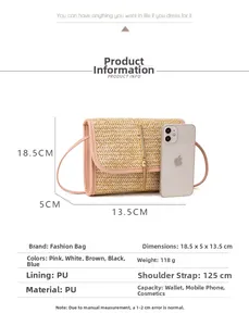 Mini straw crossbody bag with pink PU trim and golden tassel next to a phone for scale