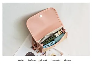 Detail view of pink leather and straw mini bag showing internal storage for essentials