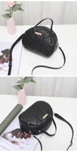 Detailed views of a black semicircular crossbody bag with quilted rhombic stitch pattern