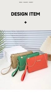 Three woven crossbody bags in gold, green, and orange with gold chain details