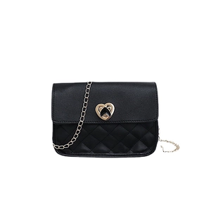 Quilted black crossbody bag with gold heart clasp and elegant metal chain strap