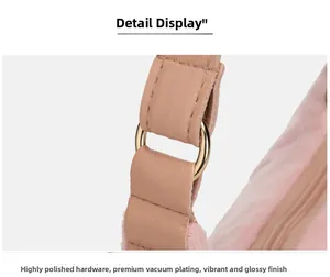 Macro detail of plush suede pink handbag with gold vacuum plated metal ring buckle