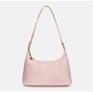 Detail of pink faux fur shoulder bag with golden zipper and plush texture hobo style