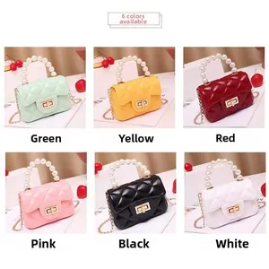 Detail of six mini jelly bags with classic quilted patterns and pearl handles in multiple colors