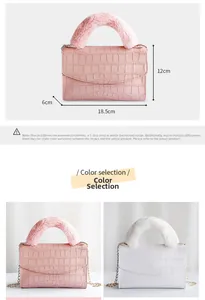 Detail showing plush handle and crocodile embossed leather mini bag with dimensions