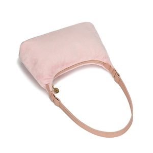 Pink faux fur underarm bag with smooth shoulder strap and gold zipper on white background