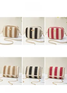 Selection of striped woven camera bags and flap chain bags in khaki, black, and red colors