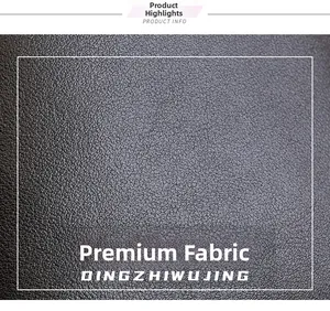 Macro shot of dark brown lychee texture leather fabric with high-quality grain detail