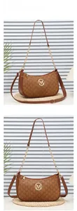Close-up of brown monogram crossbody bag with golden M metal logo and chain strap