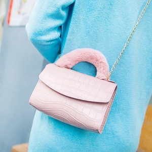 Pink faux leather crocodile handbag with plush handle and golden chain shoulder strap