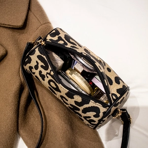 Retro leopard print canvas barrel bag for women with black leather strap and gold hardware