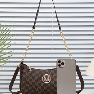 Classic brown monogram hobo bag with gold M-logo and chain strap for women